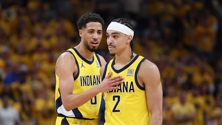 May 31, 2025; Indianapolis, Indiana, USA; Indiana Pacers guard Tyrese Haliburton (0) and guard Andrew Nembhard (2) speak in the second quarter during game six of the eastern conference finals against the New York Knicks for the 2025 NBA Playoffs at Gainbridge Fieldhouse. Mandatory Credit: Trevor Ruszkowski-Imagn Images May 31, 2025; Indianapolis, Indiana, USA; Indiana Pacers guard Tyrese Haliburton (0) and guard Andrew Nembhard (2) speak in the second quarter during game six of the eastern conference finals against the New York Knicks for the 2025 NBA Playoffs at Gainbridge Fieldhouse. Mandatory Credit: Trevor Ruszkowski-Imagn Images