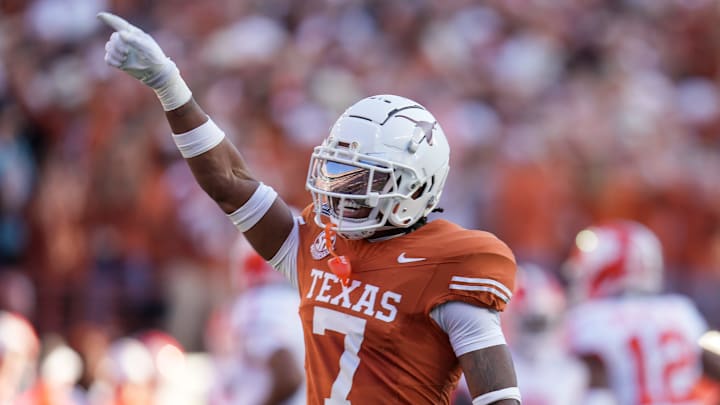 Texas Longhorns defensive back Jahdae Barron (7) celebrates a turnover against Clemson Tigers in the first half of an NCAA College Football Playoffs first round game at Darrell K Royal Texas Memorial Stadium, Austin, Texas, Saturday, Dec. 21, 2024. Texas Longhorns defensive back Jahdae Barron (7) celebrates a turnover against Clemson Tigers in the first half of an NCAA College Football Playoffs first round game at Darrell K Royal Texas Memorial Stadium, Austin, Texas, Saturday, Dec. 21, 2024.