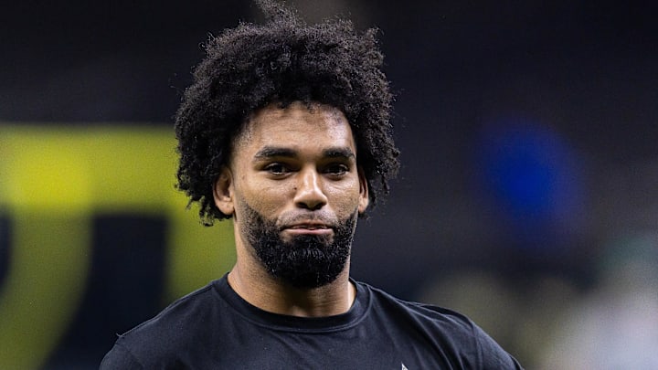 Dec 21, 2025; New Orleans, Louisiana, USA;  New Orleans Saints wide receiver Chris Olave (12) during warm ups before the game against the New York Jets at Caesars Superdome. Mandatory Credit: Stephen Lew-Imagn Images