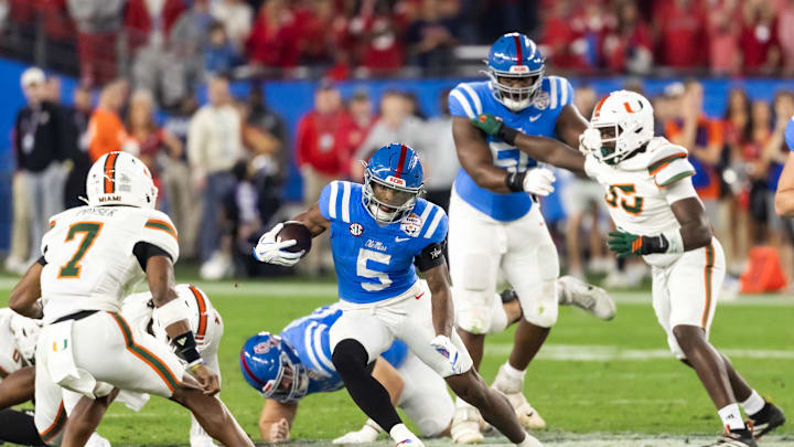 Jan 8, 2026; Glendale, AZ, USA; Mississippi Rebels running back Kewan Lacy (5) against the Miami Hurricanes during the 2026 Fiesta Bowl and semifinal game of the College Football Playoff at State Farm Stadium. Mandatory Credit: Mark J. Rebilas-Imagn Images