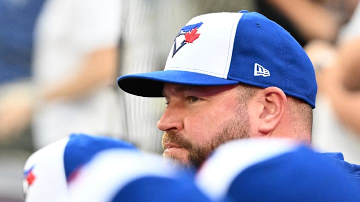 Sep 28, 2025; Toronto, Ontario, CAN; Toronto Blue Jays manager John Schneider (14) watches play against the Tampa Bay Rays in the ninth inning at Rogers Centre. Mandatory Credit: Dan Hamilton-Imagn Images Sep 28, 2025; Toronto, Ontario, CAN; Toronto Blue Jays manager John Schneider (14) watches play against the Tampa Bay Rays in the ninth inning at Rogers Centre. Mandatory Credit: Dan Hamilton-Imagn Images