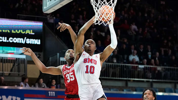 Southern Methodist Mustangs guard Zach Nutall drives against the Houston Cougars in AAC play in 2022.