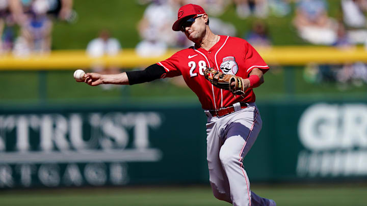 Cincinnati Reds infielder Alejo Lopez (28) throws to first for an out during a spring training game.