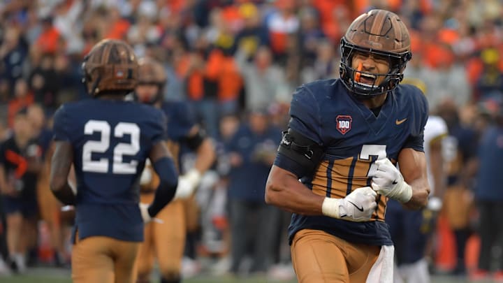 Oct 19, 2024; Champaign, Illinois, USA; Illinois Fighting Illini defensive back Matthew Bailey (7) reacts after a turnover against the Michigan Wolverines during the second half at Memorial Stadium. Mandatory Credit: Ron Johnson-Imagn Images Oct 19, 2024; Champaign, Illinois, USA; Illinois Fighting Illini defensive back Matthew Bailey (7) reacts after a turnover against the Michigan Wolverines during the second half at Memorial Stadium. Mandatory Credit: Ron Johnson-Imagn Images