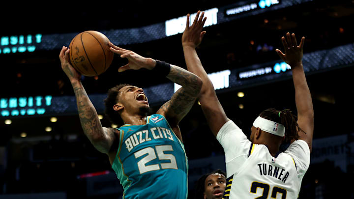 Myles Turner, of the Indiana Pacers and P.J. Washington, of the Charlotte Hornets