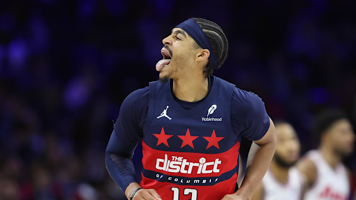 Mar 26, 2025; Philadelphia, Pennsylvania, USA; Washington Wizards guard Jordan Poole (13) reacts after scoring against the Philadelphia 76ers during the third quarter at Wells Fargo Center. Mandatory Credit: Bill Streicher-Imagn Images