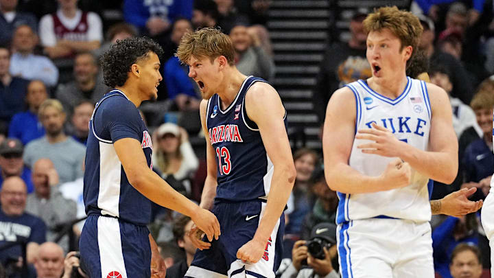 Mar 27, 2025; Newark, NJ, USA; Arizona Wildcats forward Henri Veesaar (13) celebrates with Arizona Wildcats forward Trey Townsend (4) after a play against the Duke Blue Devils during the second half during an East Regional semifinal of the 2025 NCAA tournament at Prudential Center. Mar 27, 2025; Newark, NJ, USA; Arizona Wildcats forward Henri Veesaar (13) celebrates with Arizona Wildcats forward Trey Townsend (4) after a play against the Duke Blue Devils during the second half during an East Regional semifinal of the 2025 NCAA tournament at Prudential Center.