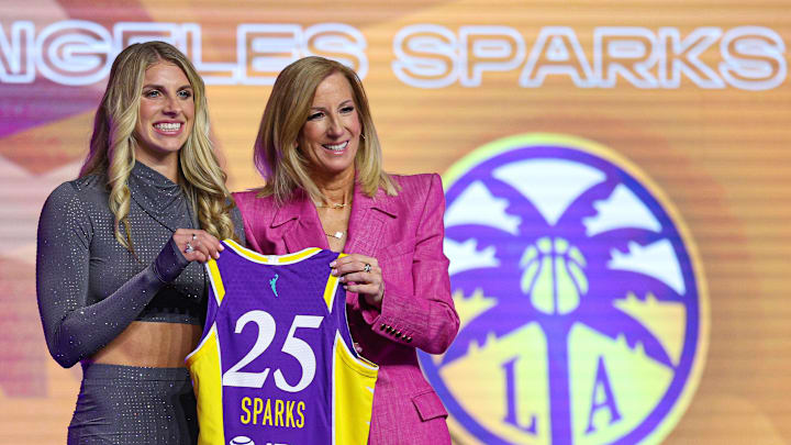 Apr 14, 2025; New York, New York, USA; Sarah Ashlee Barker poses with WNBA commissioner Cathy Engelbert after being selected with the number nine overall pick to the Los Angeles Sparks in the 2025 WNBA Draft at The Shed at Hudson Yards. Mandatory Credit: Vincent Carchietta-Imagn Images