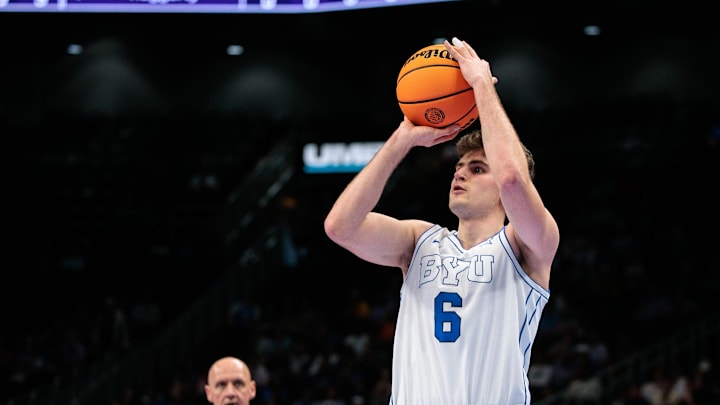 Mar 10, 2026; Kansas City, MO, USA; BYU Cougars guard Aleksej Kostic (6) shoots the ball during the second half against the Kansas State Wildcats at T-Mobile Center. Mandatory Credit: William Purnell-Imagn Images