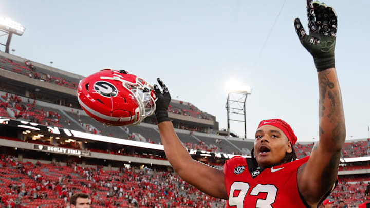Georgia defensive lineman Tyrion Ingram-Dawkins (93) celebrates after winning a NCAA college football game against Auburn in Athens, Ga., on Saturday, Oct. 5, 2024. Georgia won 31-13. Georgia defensive lineman Tyrion Ingram-Dawkins (93) celebrates after winning a NCAA college football game against Auburn in Athens, Ga., on Saturday, Oct. 5, 2024. Georgia won 31-13.