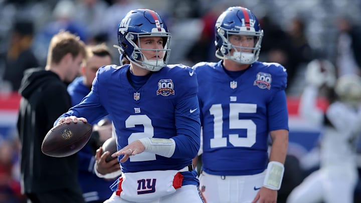 Dec 8, 2024; East Rutherford, New Jersey, USA; New York Giants quarterback Drew Lock (2) warms up in front of backup quarterback Tommy DeVito (15) before a game against the New Orleans Saints at MetLife Stadium. Mandatory Credit: Brad Penner-Imagn Images