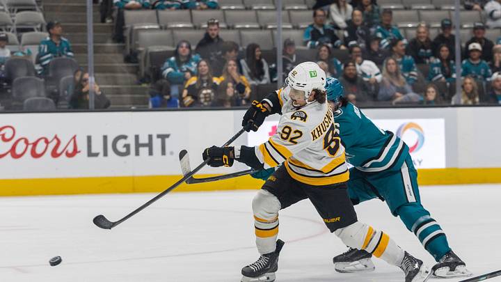 Oct 13, 2026; San Jose, California, USA;  Boston Bruins center Marat Khusnutdinov (92) shoots the puck during the third period against the San Jose Sharks at SAP Center at San Jose.  Mandatory Credit: Stan Szeto-Imagn Images