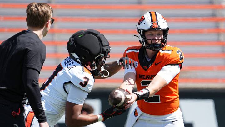 Oregon State's Braden Atkinson, right, hands the ball to Cornell Hatcher Jr. before the Oregon State Spring Game at Reser Stadium on Saturday, April 25, 2026, in Corvallis, Ore. Oregon State's Braden Atkinson, right, hands the ball to Cornell Hatcher Jr. before the Oregon State Spring Game at Reser Stadium on Saturday, April 25, 2026, in Corvallis, Ore.