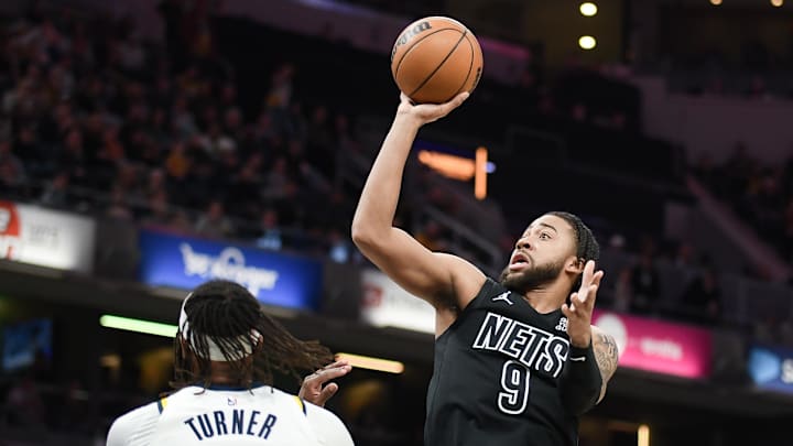Mar 22, 2025; Indianapolis, Indiana, USA; Brooklyn Nets forward Trendon Watford (9) shoots over Indiana Pacers center Myles Turner (33) during the second half at Gainbridge Fieldhouse. Mandatory Credit: Robert Goddin-Imagn Images