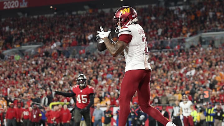 Jan 12, 2025; Tampa, Florida, USA; Washington Commanders wide receiver Dyami Brown (2) catches a touchdown during the second quarter of a NFC wild card playoff against the Tampa Bay Buccaneers at Raymond James Stadium. Mandatory Credit: Nathan Ray Seebeck-Imagn Images Jan 12, 2025; Tampa, Florida, USA; Washington Commanders wide receiver Dyami Brown (2) catches a touchdown during the second quarter of a NFC wild card playoff against the Tampa Bay Buccaneers at Raymond James Stadium. Mandatory Credit: Nathan Ray Seebeck-Imagn Images