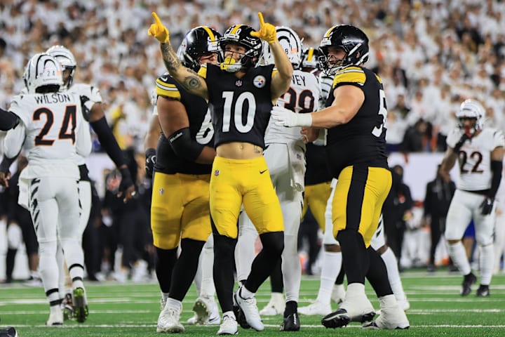 Football player celebrates touchdown Football player celebrates touchdown