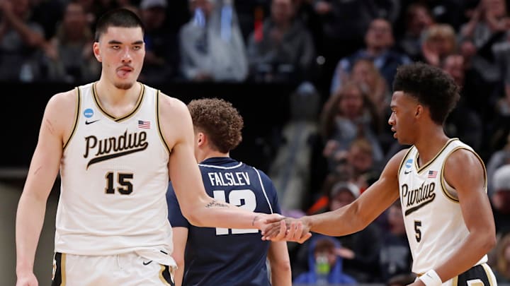 Purdue Boilermakers center Zach Edey (15) high-fives Purdue Boilermakers guard Myles Colvin (5) in the second round of the NCAA Tournament against Utah State. 