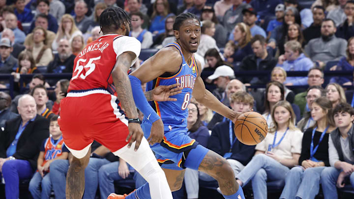 Jan 2, 2025; Oklahoma City, Oklahoma, USA; Oklahoma City Thunder forward Jalen Williams (8) dribbles around Los Angeles Clippers forward Derrick Jones Jr. (55) during the second quarter at Paycom Center. Mandatory Credit: Alonzo Adams-Imagn Images Jan 2, 2025; Oklahoma City, Oklahoma, USA; Oklahoma City Thunder forward Jalen Williams (8) dribbles around Los Angeles Clippers forward Derrick Jones Jr. (55) during the second quarter at Paycom Center. Mandatory Credit: Alonzo Adams-Imagn Images