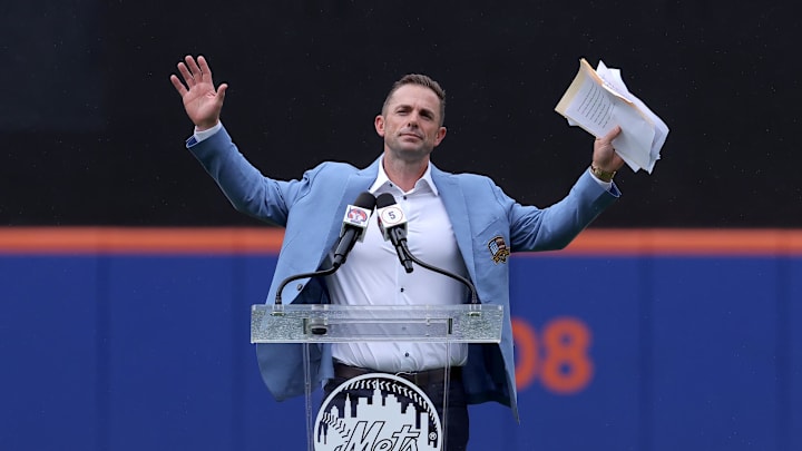 Jul 19, 2025; New York City, New York, USA; New York Mets former third baseman David Wright speaks to the crowd after his number was retired by the Mets before a game against the Cincinnati Reds at Citi Field. Mandatory Credit: Brad Penner-Imagn Images