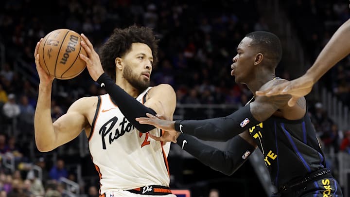 Jan 9, 2025; Detroit, Michigan, USA; Detroit Pistons guard Cade Cunningham (2) is defended by Golden State Warriors guard Dennis Schroder (71) in the first half at Little Caesars Arena. Mandatory Credit: Rick Osentoski-Imagn Images Jan 9, 2025; Detroit, Michigan, USA; Detroit Pistons guard Cade Cunningham (2) is defended by Golden State Warriors guard Dennis Schroder (71) in the first half at Little Caesars Arena. Mandatory Credit: Rick Osentoski-Imagn Images
