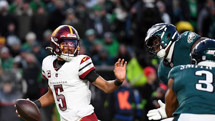 Jan 26, 2025; Philadelphia, PA, USA; Washington Commanders quarterback Jayden Daniels (5) looks to pass the ball against the Philadelphia Eagles during the second half in the NFC Championship game at Lincoln Financial Field. Mandatory Credit: Eric Hartline-Imagn Images