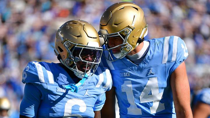 Oct 24, 2026; Pasadena, California, USA; UCLA Bruins running back Anthony Woods (6) and quarterback Ty Dieffenbach (14) celebrate after a rushing touchdown during the second half against the Michigan State Spartans at Rose Bowl. Mandatory Credit: Gary A. Vasquez-Imagn Images Oct 24, 2026; Pasadena, California, USA; UCLA Bruins running back Anthony Woods (6) and quarterback Ty Dieffenbach (14) celebrate after a rushing touchdown during the second half against the Michigan State Spartans at Rose Bowl. Mandatory Credit: Gary A. Vasquez-Imagn Images
