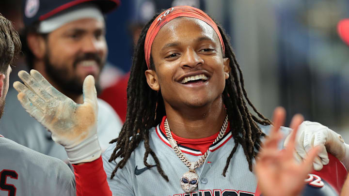 Sep 8, 2025; Miami, Florida, USA; Washington Nationals shortstop CJ Abrams (5) celebrates with teammates after scoring against the Miami Marlins during the fifth inning at loanDepot Park. Mandatory Credit: Sam Navarro-Imagn Images Sep 8, 2025; Miami, Florida, USA; Washington Nationals shortstop CJ Abrams (5) celebrates with teammates after scoring against the Miami Marlins during the fifth inning at loanDepot Park. Mandatory Credit: Sam Navarro-Imagn Images