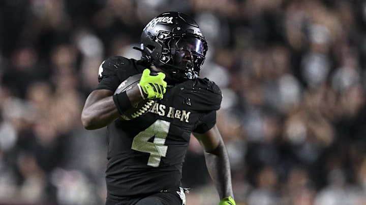 Oct 4, 2025; College Station, Texas, USA; Texas A&M Aggies running back Rueben Owens II (4) runs the ball during the fourth quarter against the Mississippi State Bulldogs at Kyle Field. Mandatory Credit: Maria Lysaker-Imagn Images 