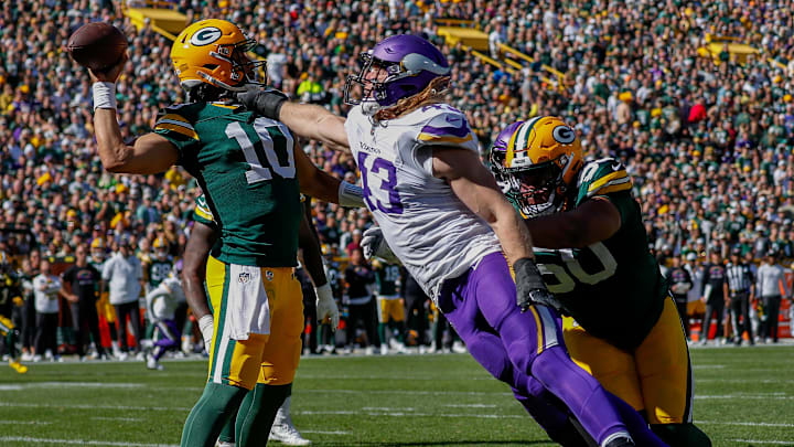 Green Bay Packers quarterback Jordan Love (10) throws the ball away under pressure from Minnesota Vikings linebacker Andrew Van Ginkel (43) on Sunday, September 29, 2024, at Lambeau Field in Green Bay, Wis. The Vikings won the game, 31-29.