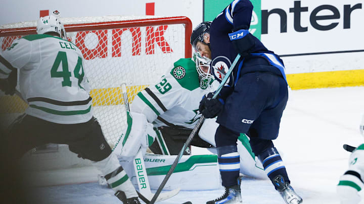 May 7, 2025; Winnipeg, Manitoba, CAN; Dallas Stars defenseman Cody Ceci (44) and Winnipeg Jets forward Gabriel Vilardi (13) battle for the puck in front of Dallas Stars goalie Jake Oettinger (29) during the third period in game one of the second round of the 2025 Stanley Cup Playoffs at Canada Life Centre. Mandatory Credit: Terrence Lee-Imagn Images