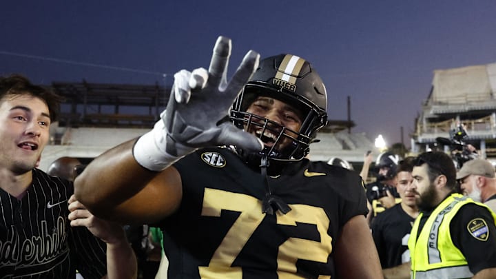 Oct 5, 2024; Nashville, Tennessee, USA;  Vanderbilt Commodores offensive lineman Josh Raymond (72) celebrates after defeating  the Alabama Crimson Tide at FirstBank Stadium. Mandatory Credit: Butch Dill-Imagn Images