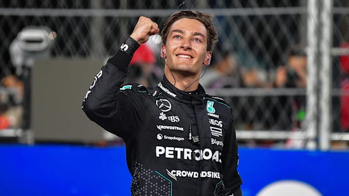 Nov 23, 2024; Las Vegas, Nevada, USA; Mercedes AMG Petronas driver George Russell (63) celebrates his race victory of the Las Vegas Grand Prix at Las Vegas Circuit. Mandatory Credit: Gary A. Vasquez-Imagn Images