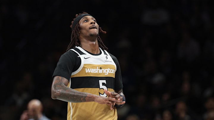 Apr 5, 2026; Brooklyn, New York, USA; Washington Wizards guard Jamir Watkins (5) reacts after making a three point basket during the second half against the Brooklyn Nets at Barclays Center. Mandatory Credit: Vincent Carchietta-Imagn Images