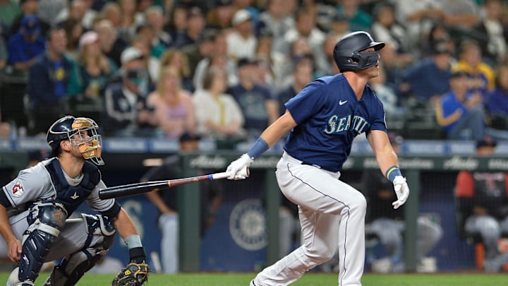Seattle Mariners first baseman Jake Lamb (18) hits a home run against the Cleveland Guardians during the seventh inning at T-Mobile Park in 2022.