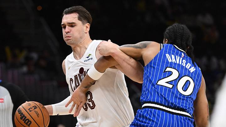 Oct 11, 2026; Cleveland, Ohio, USA; Cleveland Cavaliers forward Mario Hezonja (33) drives to the basket against Orlando Magic guard JD Davison (20) during the second half at Rocket Arena. Mandatory Credit: Ken Blaze-Imagn Images Oct 11, 2026; Cleveland, Ohio, USA; Cleveland Cavaliers forward Mario Hezonja (33) drives to the basket against Orlando Magic guard JD Davison (20) during the second half at Rocket Arena. Mandatory Credit: Ken Blaze-Imagn Images