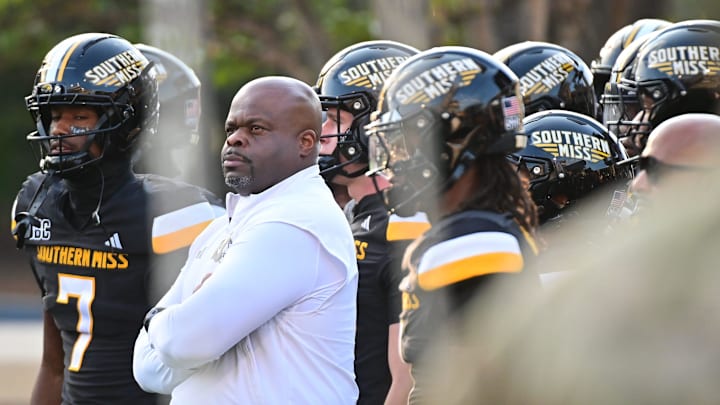 Southern Miss Golden Eagles head coach Charles Huff stands with players before the game against the Appalachian State Mountaineers at M.M. Roberts Stadium in Hattiesburg, Mississippi, on September 13, 2025.