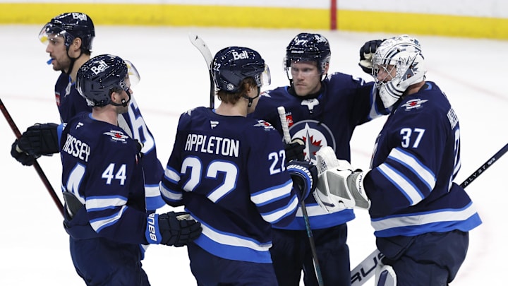 Nov 3, 2024; Winnipeg, Manitoba, CAN; Winnipeg Jets celebrate their victory over the Tampa Bay Lightning at Canada Life Centre. Mandatory Credit: James Carey Lauder-Imagn Images