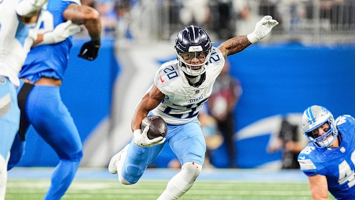 Tennessee Titans running back Tony Pollard (20) runs against Detroit Lions during the first half at Ford Field in Detroit on Sunday, Oct. 27, 2024.