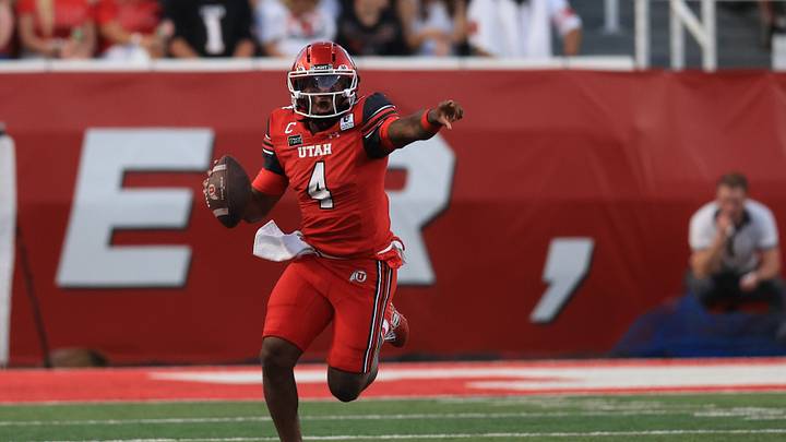 Sep 3, 2026; Salt Lake City, Utah, USA;  Utah quarterback Devon Dampier (4) looks to throw on the run against the Idaho Vandals during the first quarter at Rice-Eccles Stadium.  Mandatory Credit: Rob Gray-Imagn Images