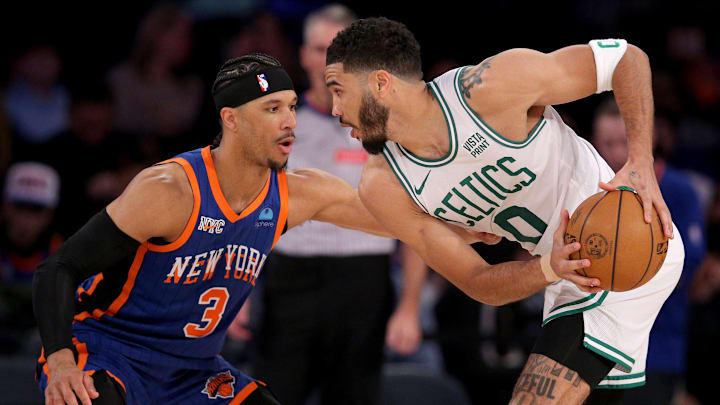 Feb 24, 2024; New York, New York, USA; Boston Celtics forward Jayson Tatum (0) controls the ball against New York Knicks guard Josh Hart (3) during the third quarter at Madison Square Garden. Mandatory Credit: Brad Penner-Imagn Images