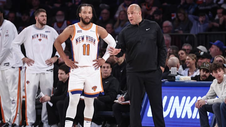 Dec 1, 2024; New York, New York, USA;  New York Knicks guard Jalen Brunson (11) talks with Assistant Coach Rick Brunson in the third quarter against the New Orleans Pelicans at Madison Square Garden. Mandatory Credit: Wendell Cruz-Imagn Images
