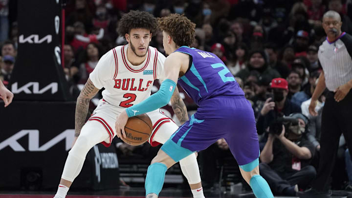  Chicago Bulls guard Lonzo Ball (2) defends Charlotte Hornets guard LaMelo Ball (2) during the first half at United Center. Mandatory Credit: David Banks-Imagn Images