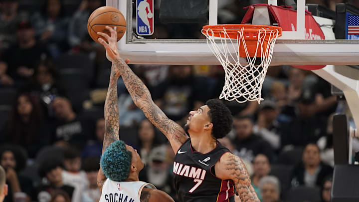 Feb 1, 2025; San Antonio, Texas, USA; Miami Heat center Kel'el Ware (7) blocks the shot attempt by San Antonio Spurs forward Jeremy Sochan (10) during the second half at Frost Bank Center. Mandatory Credit: Scott Wachter-Imagn Images