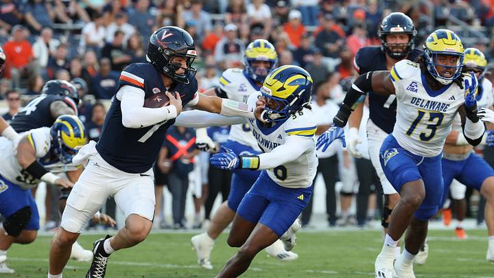 Sep 26, 2026; Charlottesville, Virginia, USA; Virginia Cavaliers quarterback Beau Pribula (7) runs with the ball as Delaware Blue Hens defensive back Nasir Eatmon (36) chases during the first half at Scott Stadium. Mandatory Credit: Geoff Burke-Imagn Images Sep 26, 2026; Charlottesville, Virginia, USA; Virginia Cavaliers quarterback Beau Pribula (7) runs with the ball as Delaware Blue Hens defensive back Nasir Eatmon (36) chases during the first half at Scott Stadium. Mandatory Credit: Geoff Burke-Imagn Images