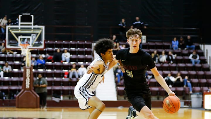 Logan-Rogersville's Chase Branham drives to the basket as the Wildcats took on the Sparta Trojans at Hammons Student Center in a first round Blue Division matchup during the Blue and Gold Tournament on Thursday, Dec. 26, 2024.