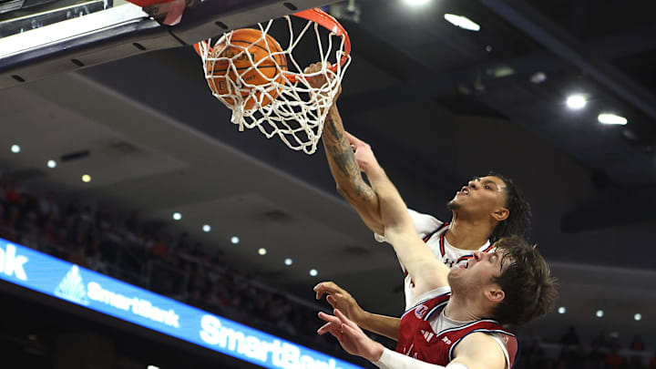 Dec 8, 2024; Auburn, Alabama, USA;  Auburn Tigers forward Jahki Howard (3) is fouled by Richmond Spiders forward Jonathan Beagle (9) during the second half at Neville Arena. Mandatory Credit: John Reed-Imagn Images