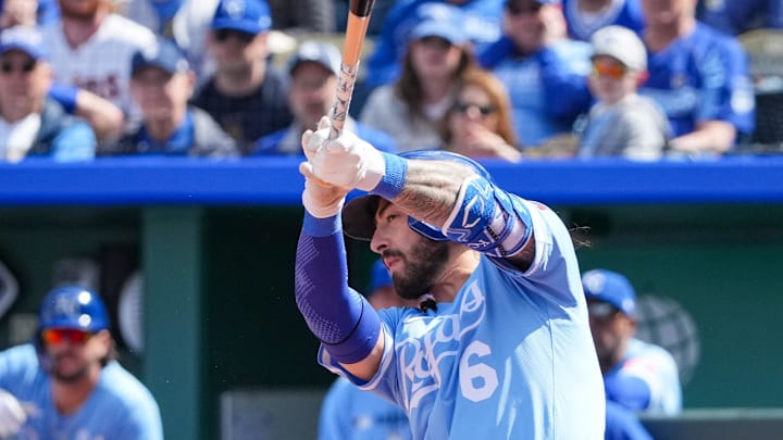 Apr 10, 2025; Kansas City, Missouri, USA; Kansas City Royals third baseman Jonathan India (6) hits a one run single against the Minnesota Twins in the seventh inning at Kauffman Stadium. Mandatory Credit: Denny Medley-Imagn Images
