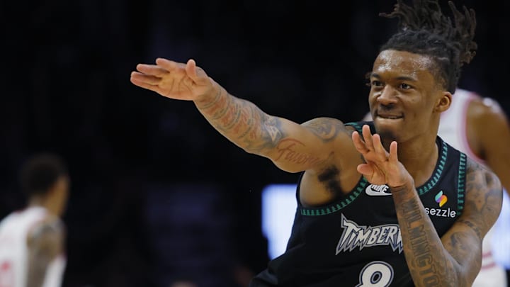 Mar 25, 2026; Minneapolis, Minnesota, USA; Minnesota Timberwolves guard Bones Hyland (8) celebrates his three-point basket to the bench for the Houston Rockets in the third quarter at Target Center. Mandatory Credit: Bruce Kluckhohn-Imagn Images Mar 25, 2026; Minneapolis, Minnesota, USA; Minnesota Timberwolves guard Bones Hyland (8) celebrates his three-point basket to the bench for the Houston Rockets in the third quarter at Target Center. Mandatory Credit: Bruce Kluckhohn-Imagn Images