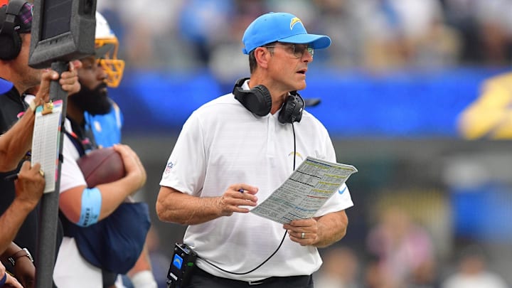 Oct 27, 2024; Inglewood, California, USA; Los Angeles Chargers head coach Jim Harbaugh watches game action against the New Orleans Saints during the second half at SoFi Stadium. Mandatory Credit: Gary A. Vasquez-Imagn Images