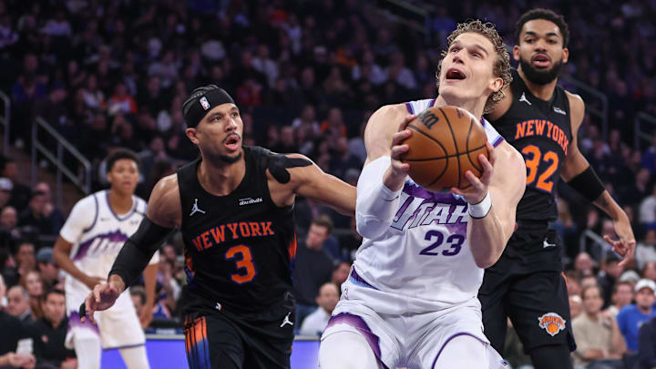 Dec 5, 2025; New York, New York, USA;  Utah Jazz forward Lauri Markkanen (23) looks to post up against New York Knicks guard Josh Hart (3) in the first quarter at Madison Square Garden. Mandatory Credit: Wendell Cruz-Imagn Images